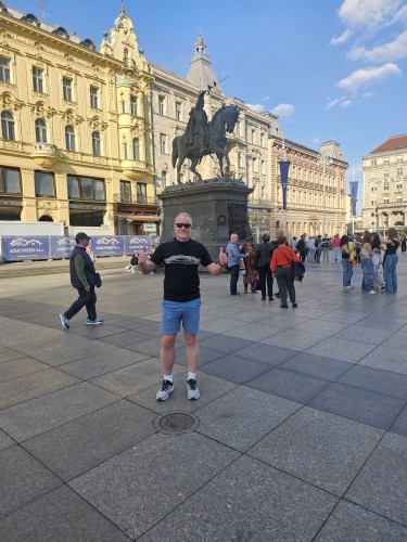Chris Brown stood next to the Zagreb Zero Kilometer
